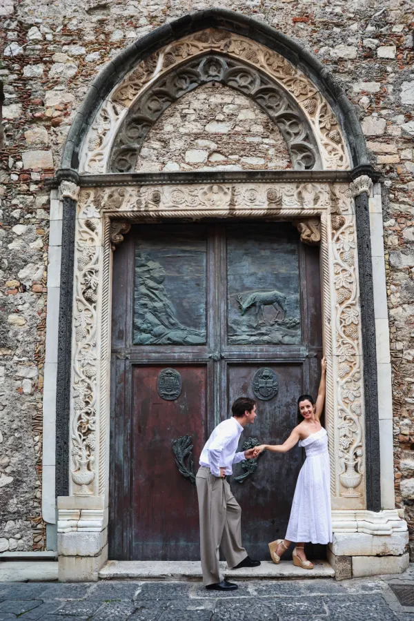 019-couple-holding-hands-at-an-ancient-church-in-taormina