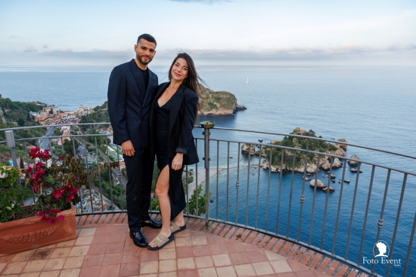 Couple photo session with Isola Bella view during an exclusive marriage proposal in Sicily"
