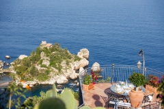  "Proposta matrimonio Isola Bella al tramonto: vista esclusiva su mare e amore"
