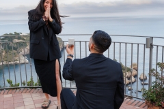 Romantic moment during the wedding proposal Isola Bella with sea view