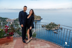 Couple photo session with Isola Bella view during an exclusive marriage proposal in Sicily"