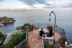 Couple photo session with Isola Bella view during an exclusive marriage proposal in Sicily"