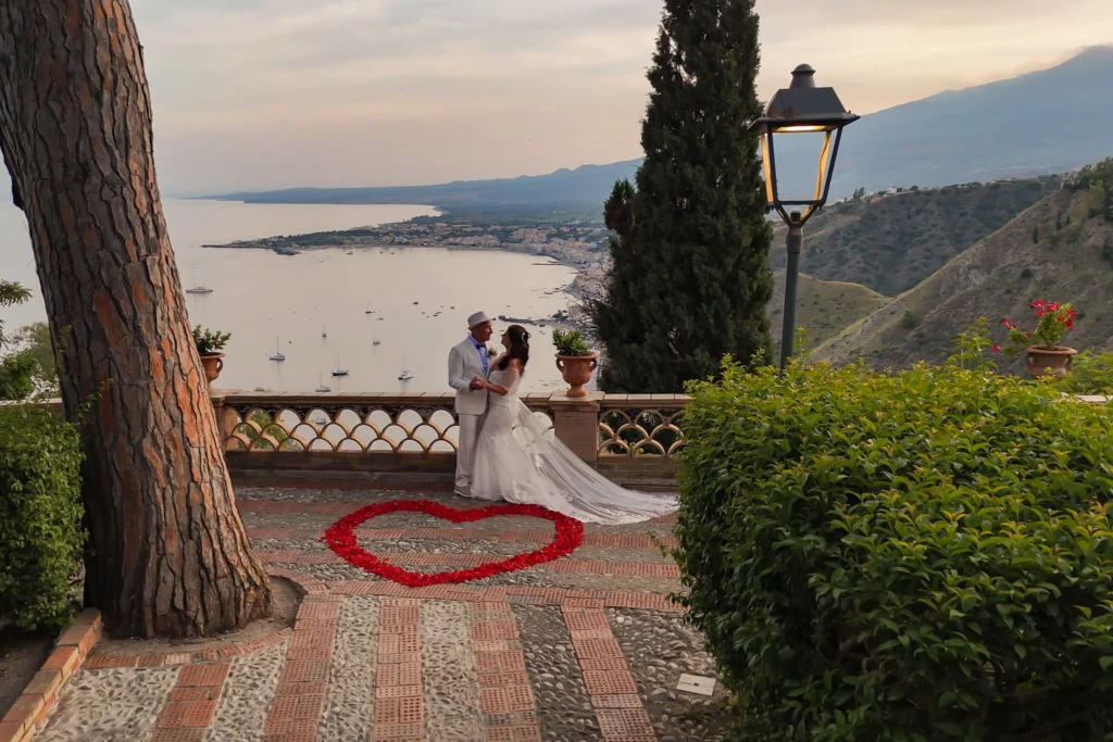 bride and groom dancing after elopement in Taormina