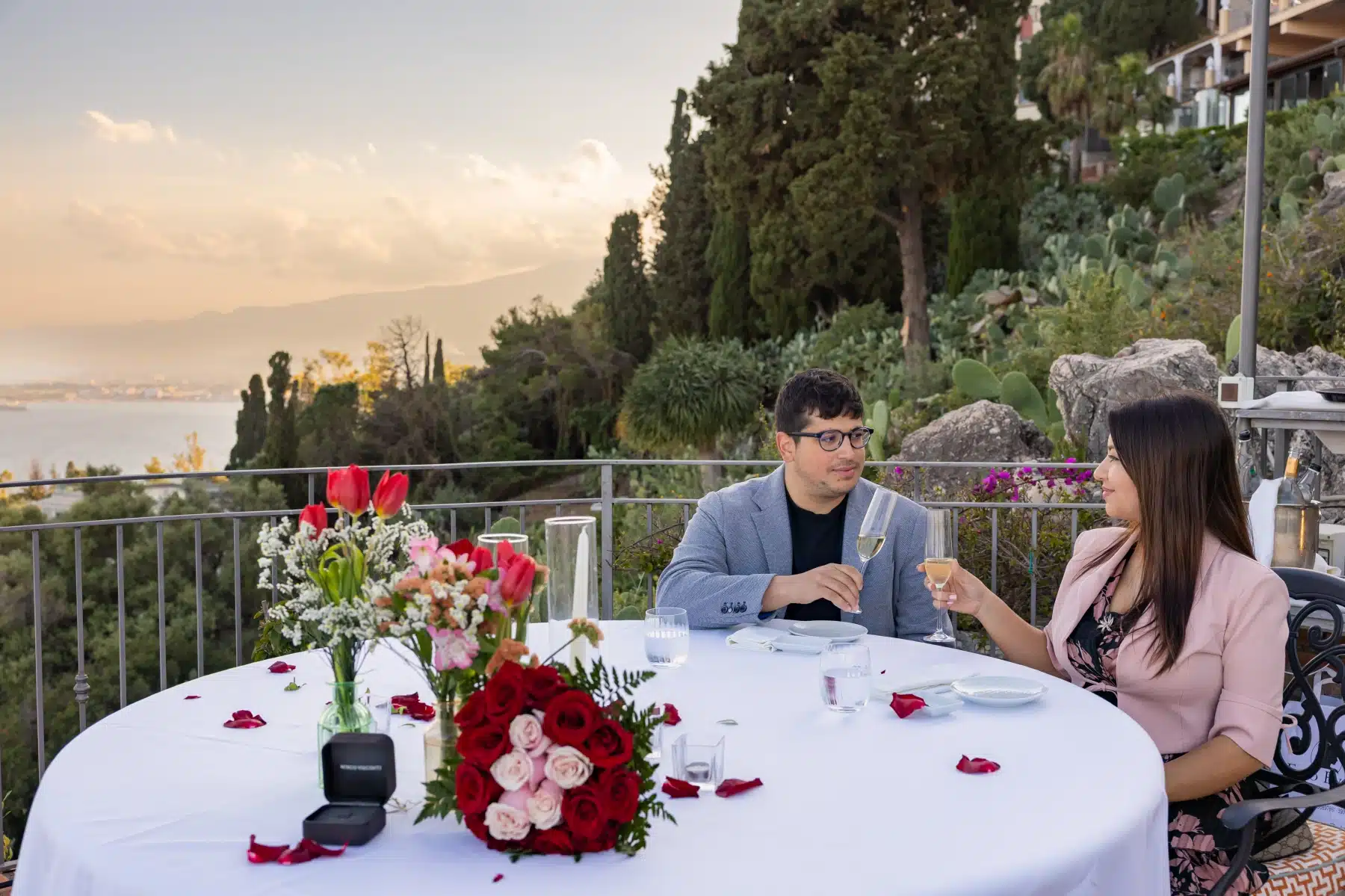 Romantic dinner setup after a proposal on a terrace in Taormina