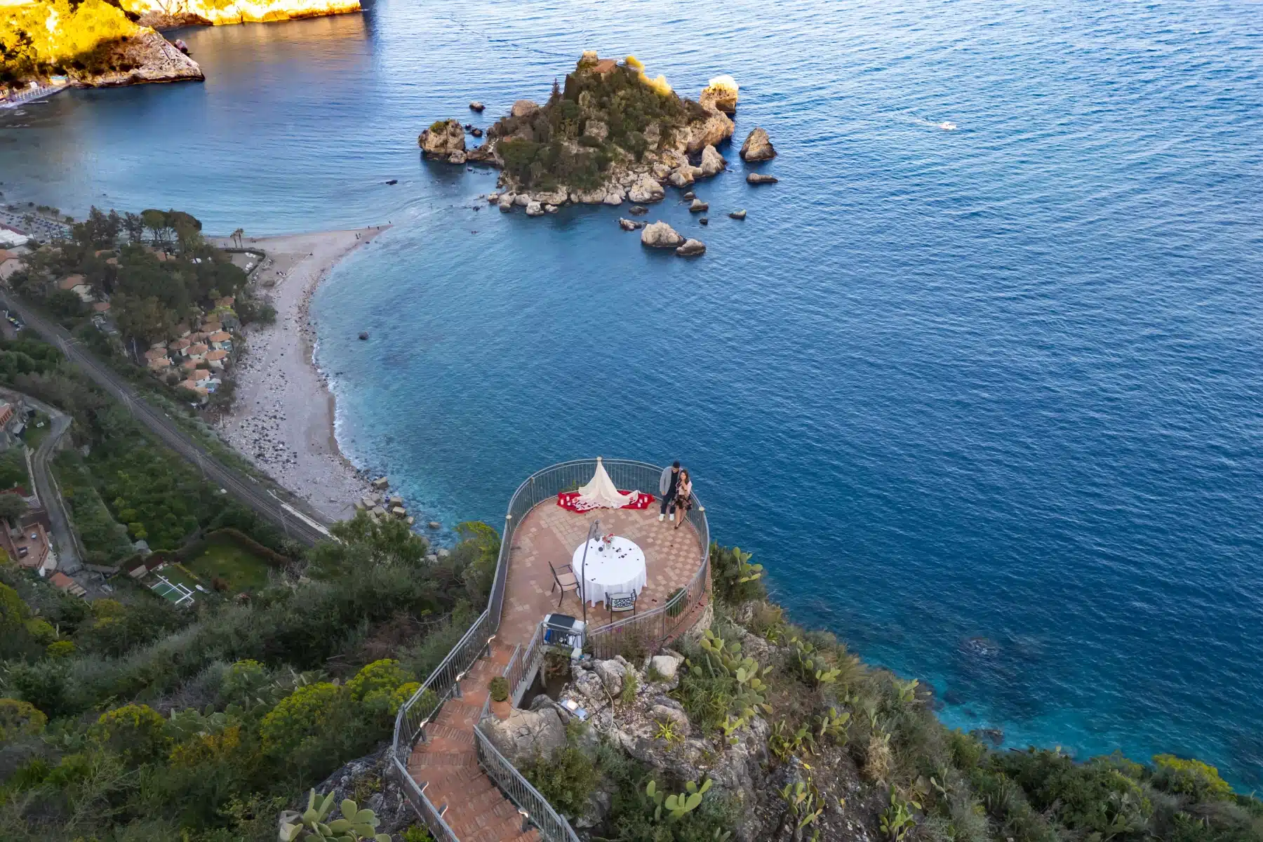 Aerial view of a proposal terrace on a cliff in Taormina